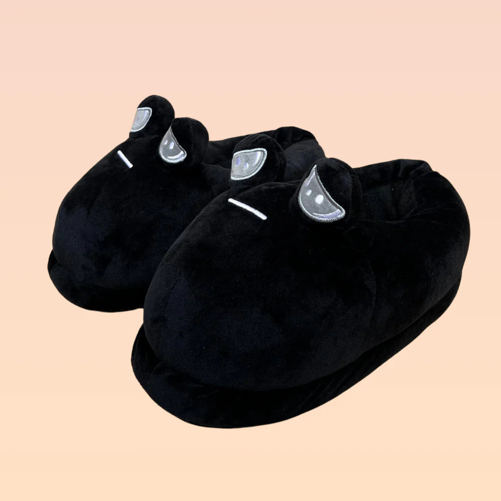 Dép bông mặt ủ rũ nhìn từ trên xuống